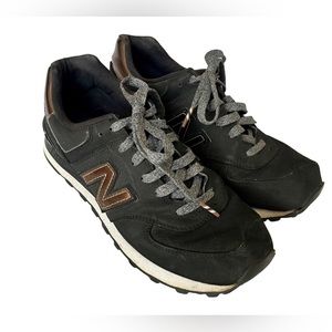 New Balance Fashion Sneaker Black with Rose Gold accents size 8.5